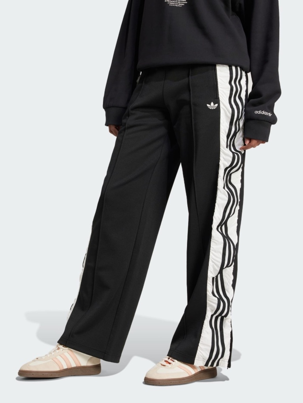 ADIDAS ORIGINALS R3CD TRACK PANTS FLOWING TRACK PANTS WITH A V-SHAPE WAIST.
